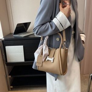 NWT Elegant Tan Handbag with H Design